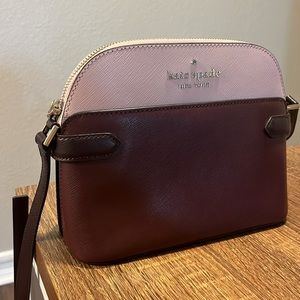 Kate Spade crossbody bag in plum and pink two tone color